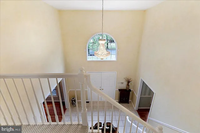 a view of a hallway with windows