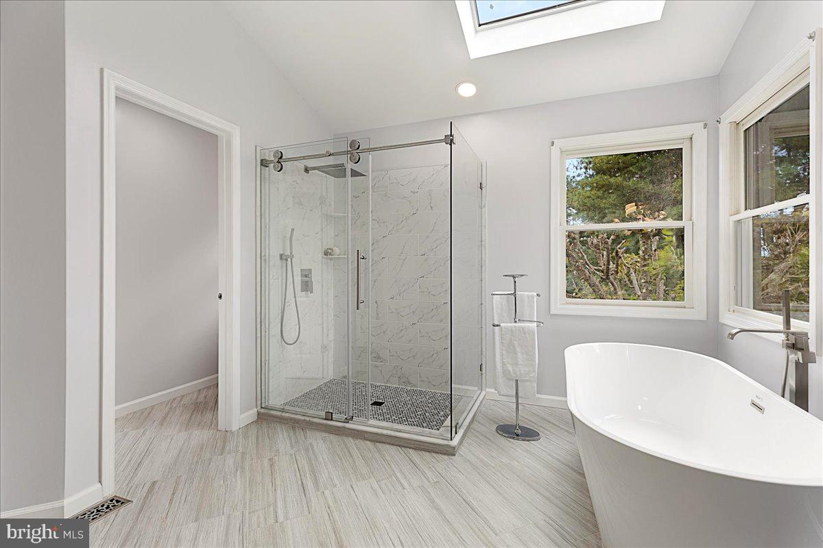4 Banff Drive Princeton Junction, NJ 08550 - Photo 26 of 46 a bathroom with a tub shower and window