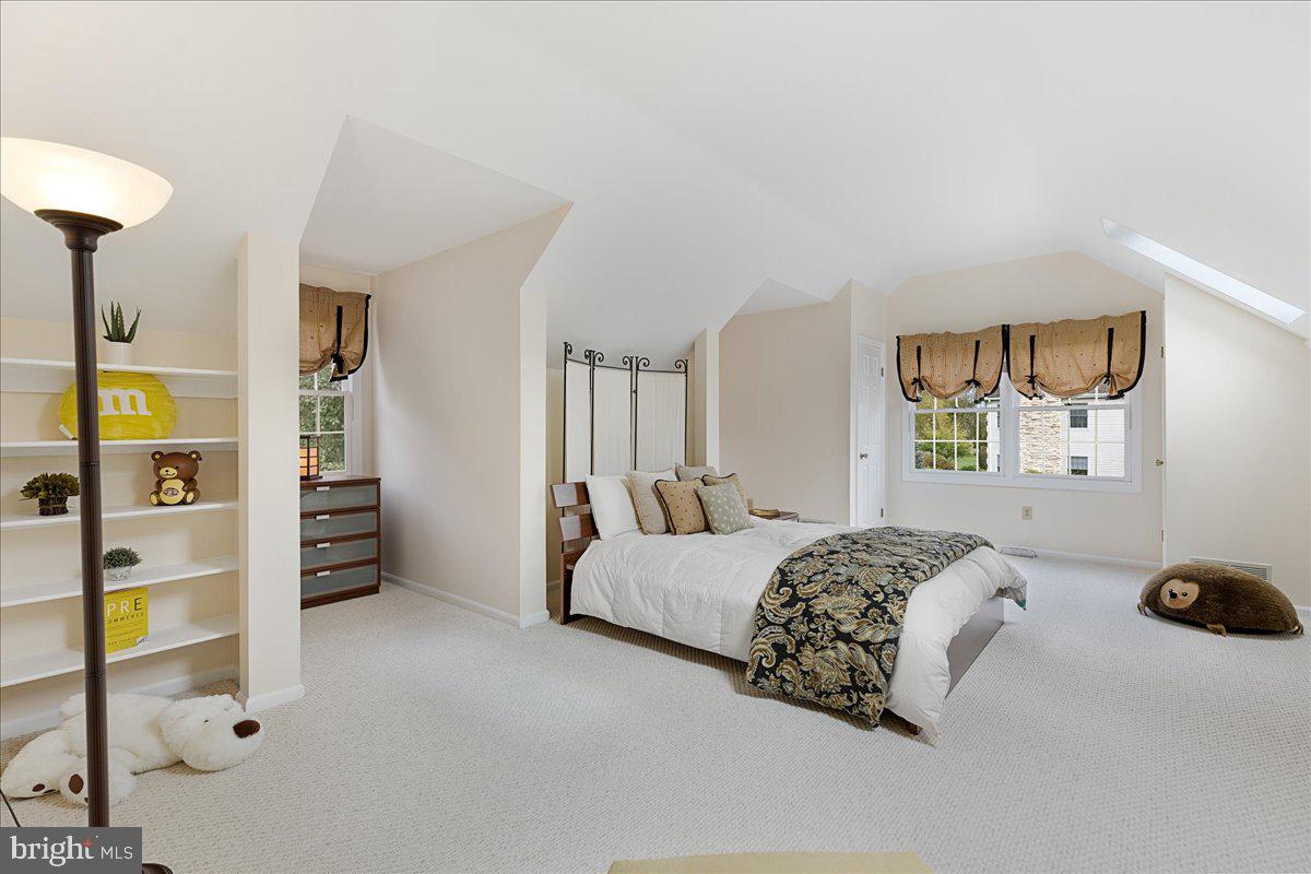 4 Banff Drive Princeton Junction, NJ 08550 - Photo 27 of 46 a bedroom with a bed and a walk in closet