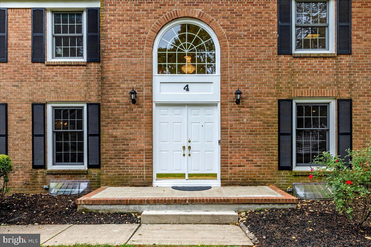 4 Banff Drive Princeton Junction, NJ 08550 - Photo 3 of 46 a front view of a house with a garden