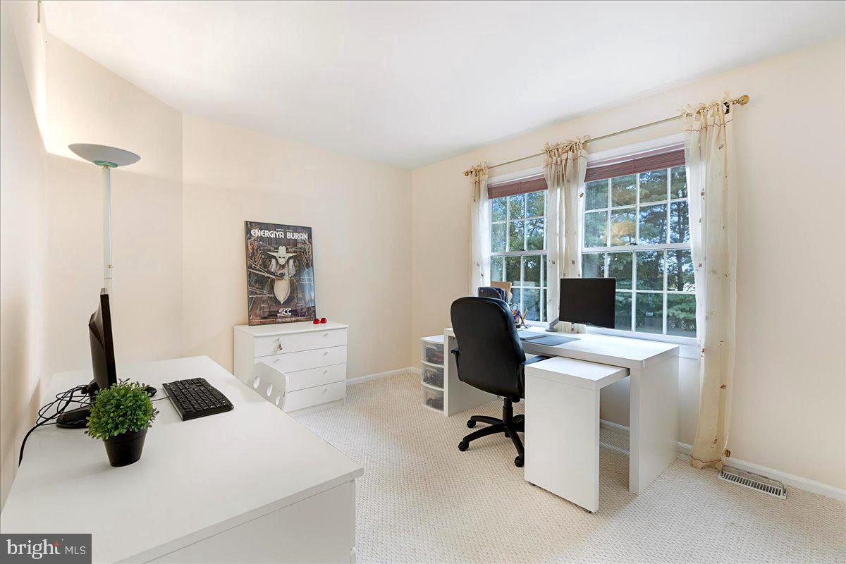 4 Banff Drive Princeton Junction, NJ 08550 - Photo 31 of 46 a view of a workspace with furniture and a window