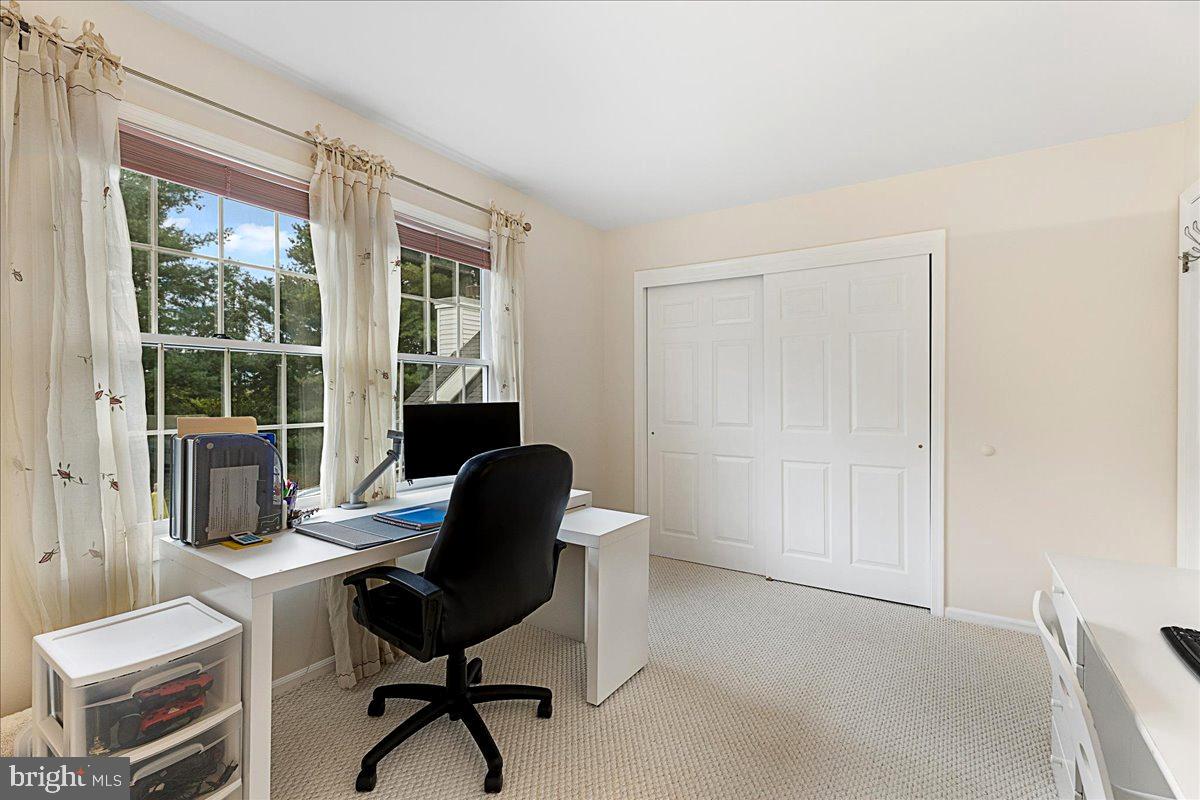 4 Banff Drive Princeton Junction, NJ 08550 - Photo 32 of 46 a view of a workspace with furniture and a window