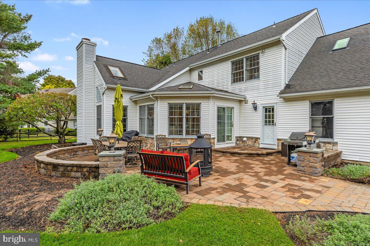 4 Banff Drive Princeton Junction, NJ 08550 - Photo 38 of 46 a front view of house with a garden and patio