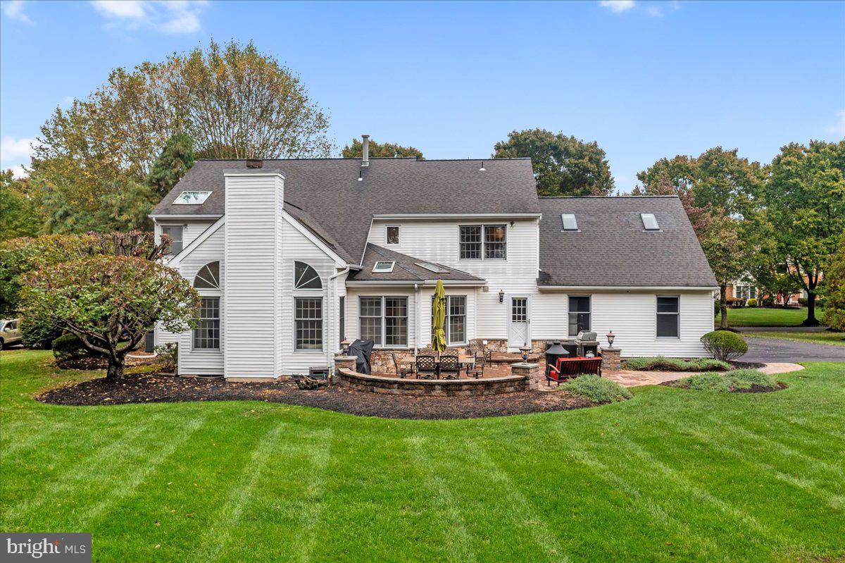 4 Banff Drive Princeton Junction, NJ 08550 - Photo 42 of 46 a front view of house with yard and outdoor seating