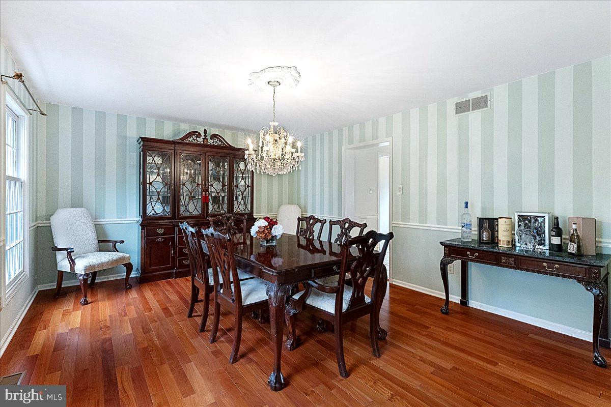 4 Banff Drive Princeton Junction, NJ 08550 - Photo 8 of 46 a view of a dining room with furniture window and wooden floor