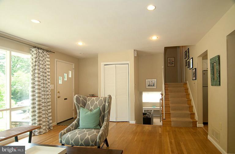 6503 Stoneham Road Bethesda, MD 20817 - Photo 13 of 24 Stairs down to Family Room