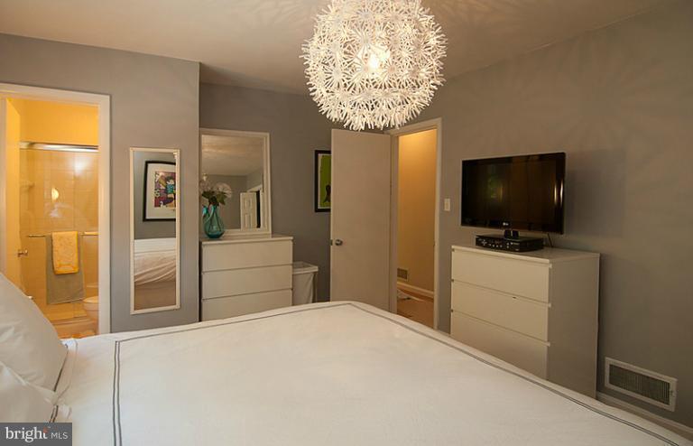 6503 Stoneham Road Bethesda, MD 20817 - Photo 16 of 24 Master Bedroom with en suite bath