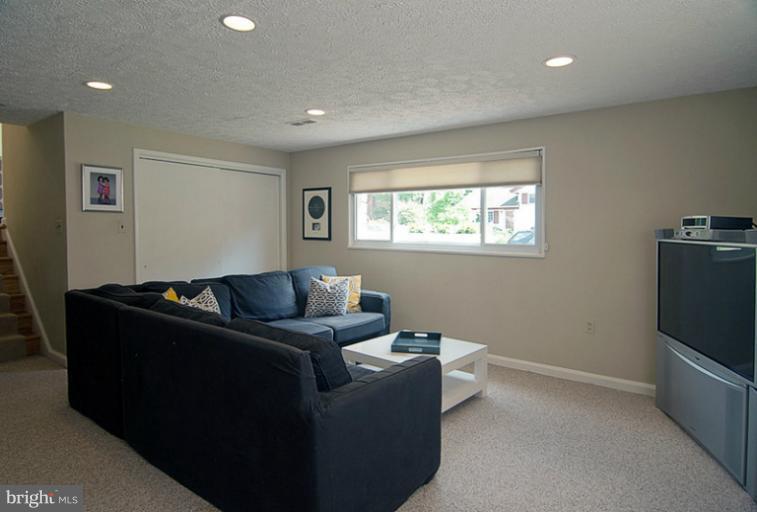 6503 Stoneham Road Bethesda, MD 20817 - Photo 6 of 24 Family Room with lots of light!