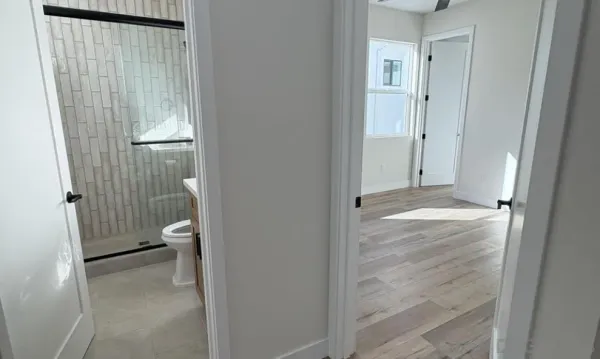 a bathroom with a sink toilet tub and shower