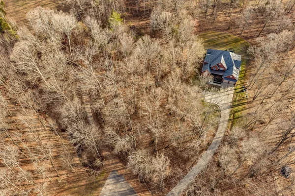 a picture of a wall with a shower in back