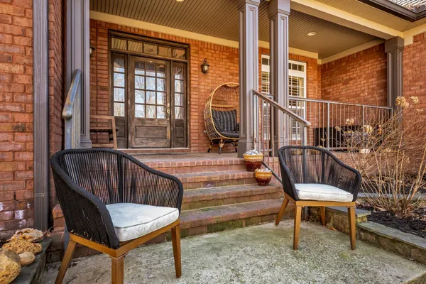 a view of balcony with wooden floor