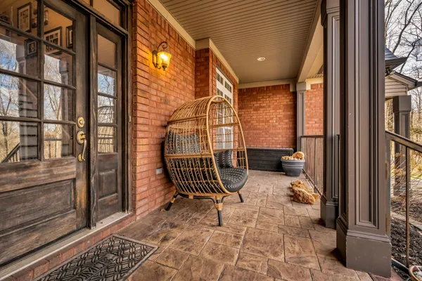a view of entryway with stairs and wooden floor