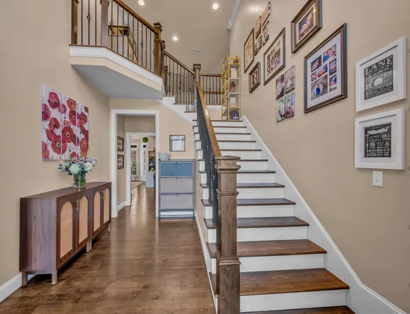 a view of entryway with wooden floor and a potted plant