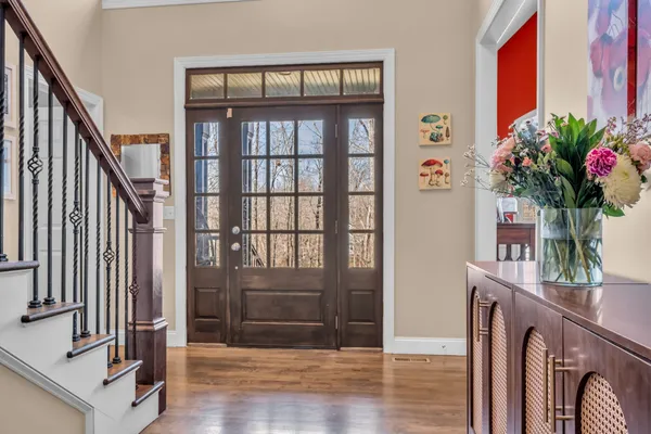 a view of an entryway with a workspace