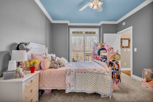 a bathroom with a sink vanity granite tub shower and mirror