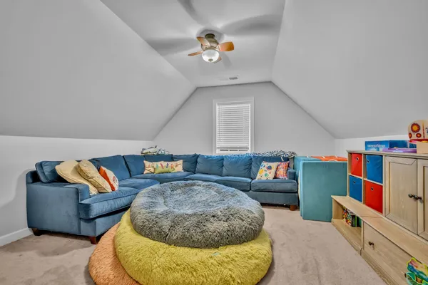 a view of a house with outdoor seating