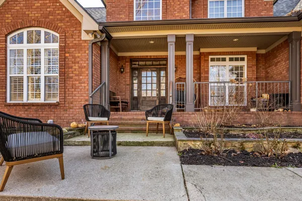 a view of a building with outdoor seating