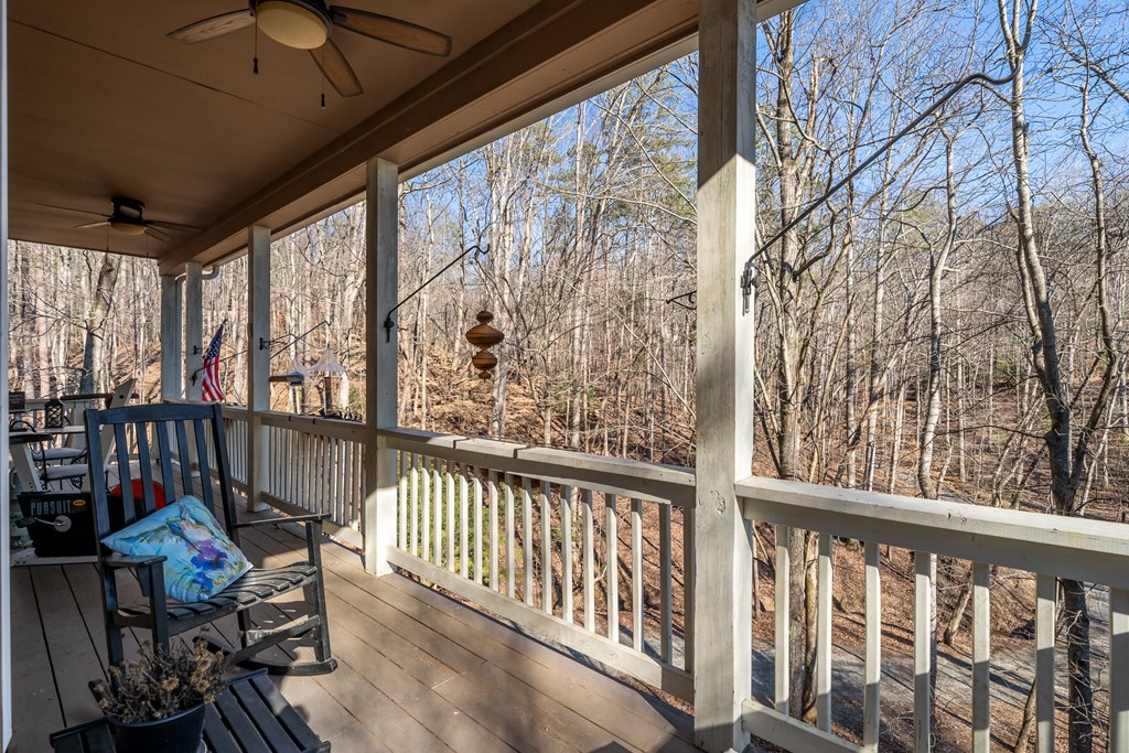 160 Primrose Court Ellijay, GA 30540 - Photo 31 of 52 a view of a balcony with chairs and wooden fence