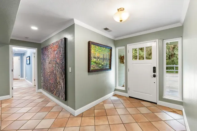 a view of a hallway with bathroom