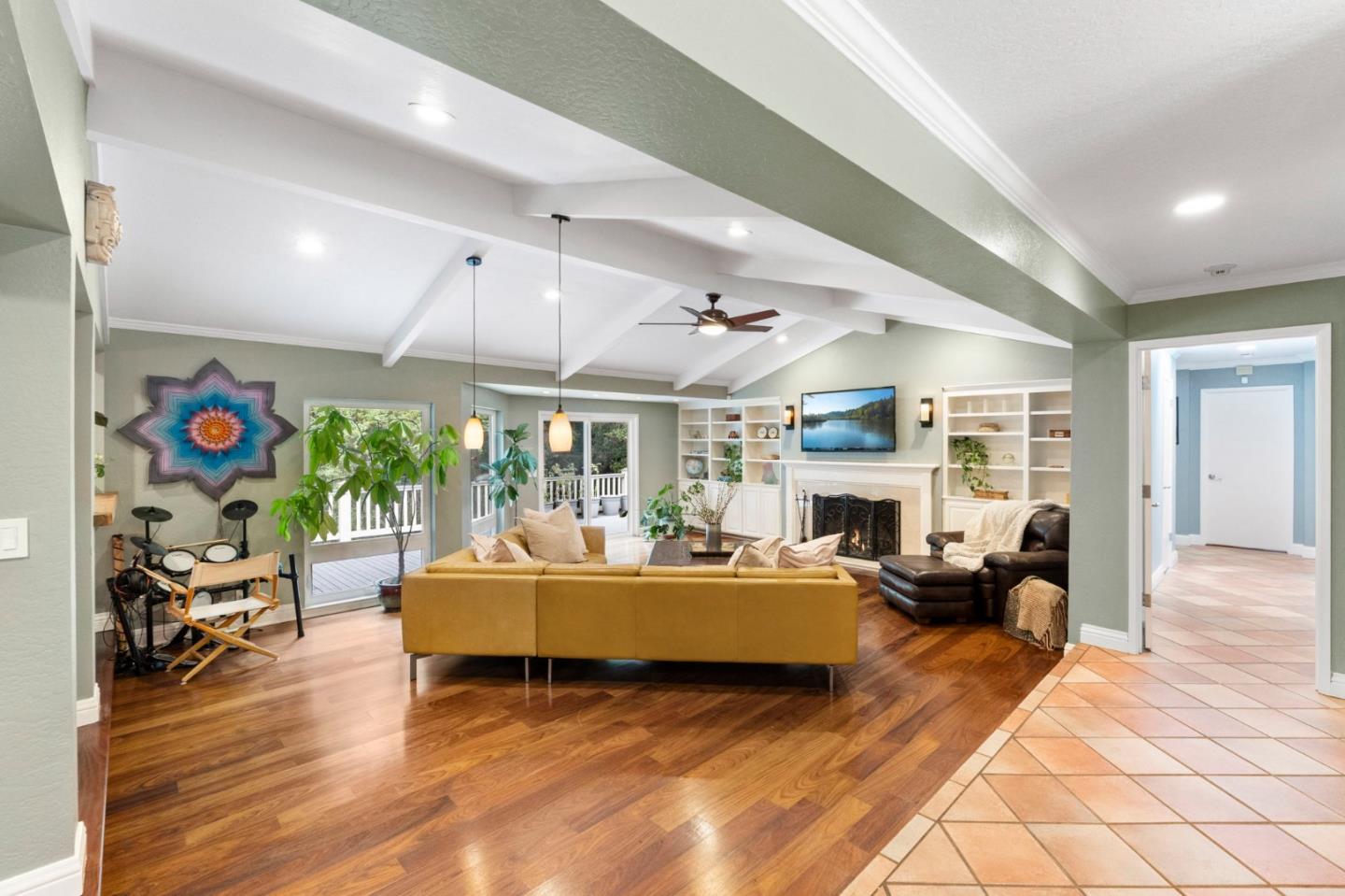 Undisclosed Address Santa Cruz, CA 95060 - Photo 3 of 35 a living room with fireplace furniture and a large window
