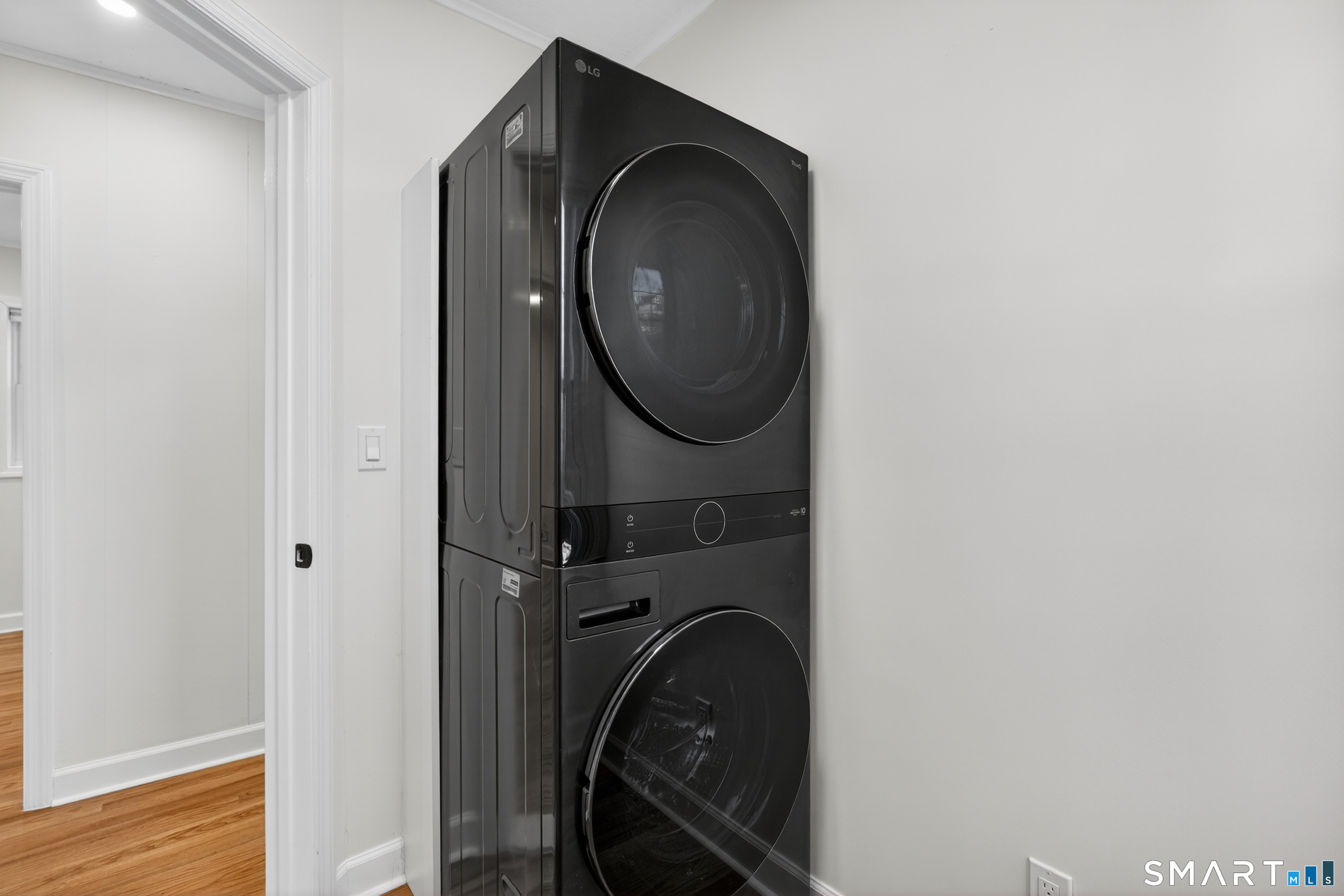 195 Laurel Place Bridgeport, CT 06604 - Photo 13 of 14 a close view of a utility room with dryer and washer
