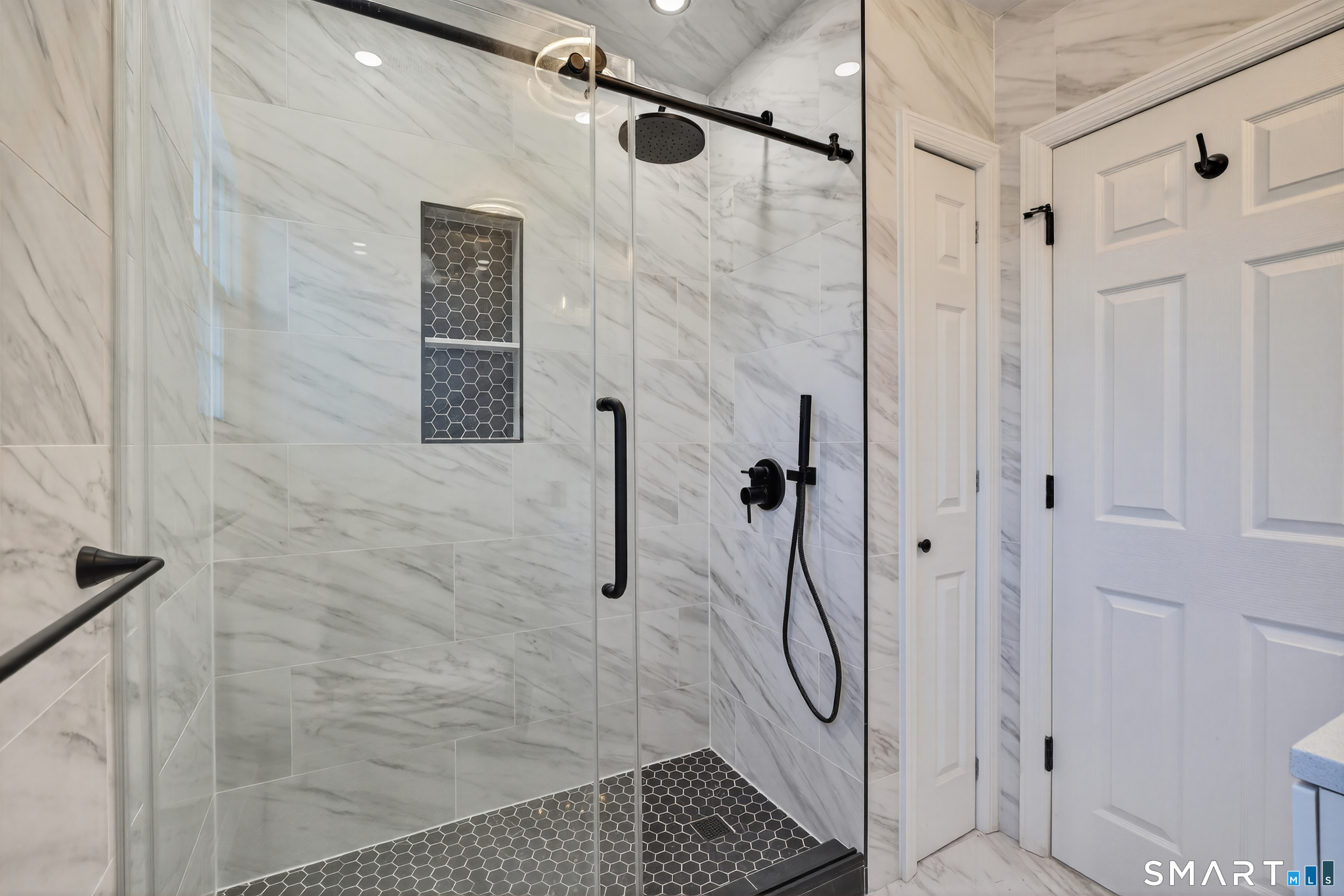 195 Laurel Place Bridgeport, CT 06604 - Photo 5 of 14 a bathroom with a shower