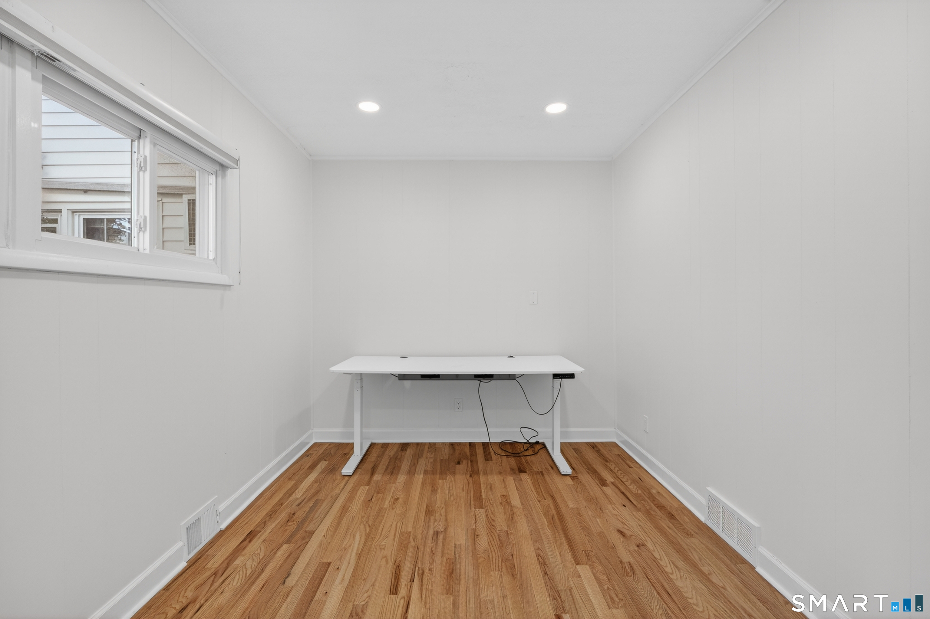 195 Laurel Place Bridgeport, CT 06604 - Photo 10 of 14 a view of room with wooden floor and furniture