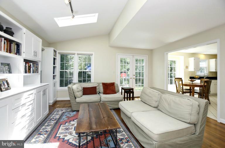 5117 Sangamore Road Bethesda, MD 20816 - Photo 14 of 26 Family Room with Built-ins and Skylights