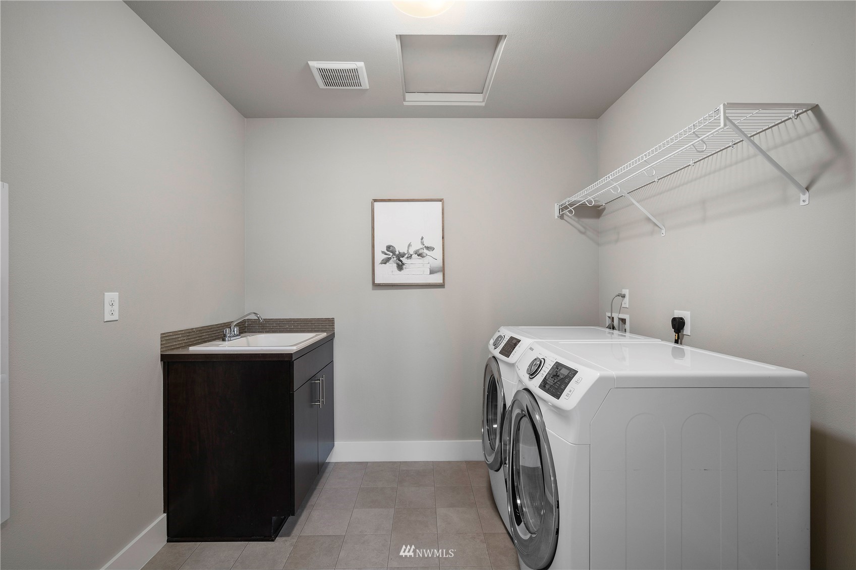5223 Northeast 11th Place Renton, WA 98059 - Photo 23 of 30 a utility room with dryer and washer