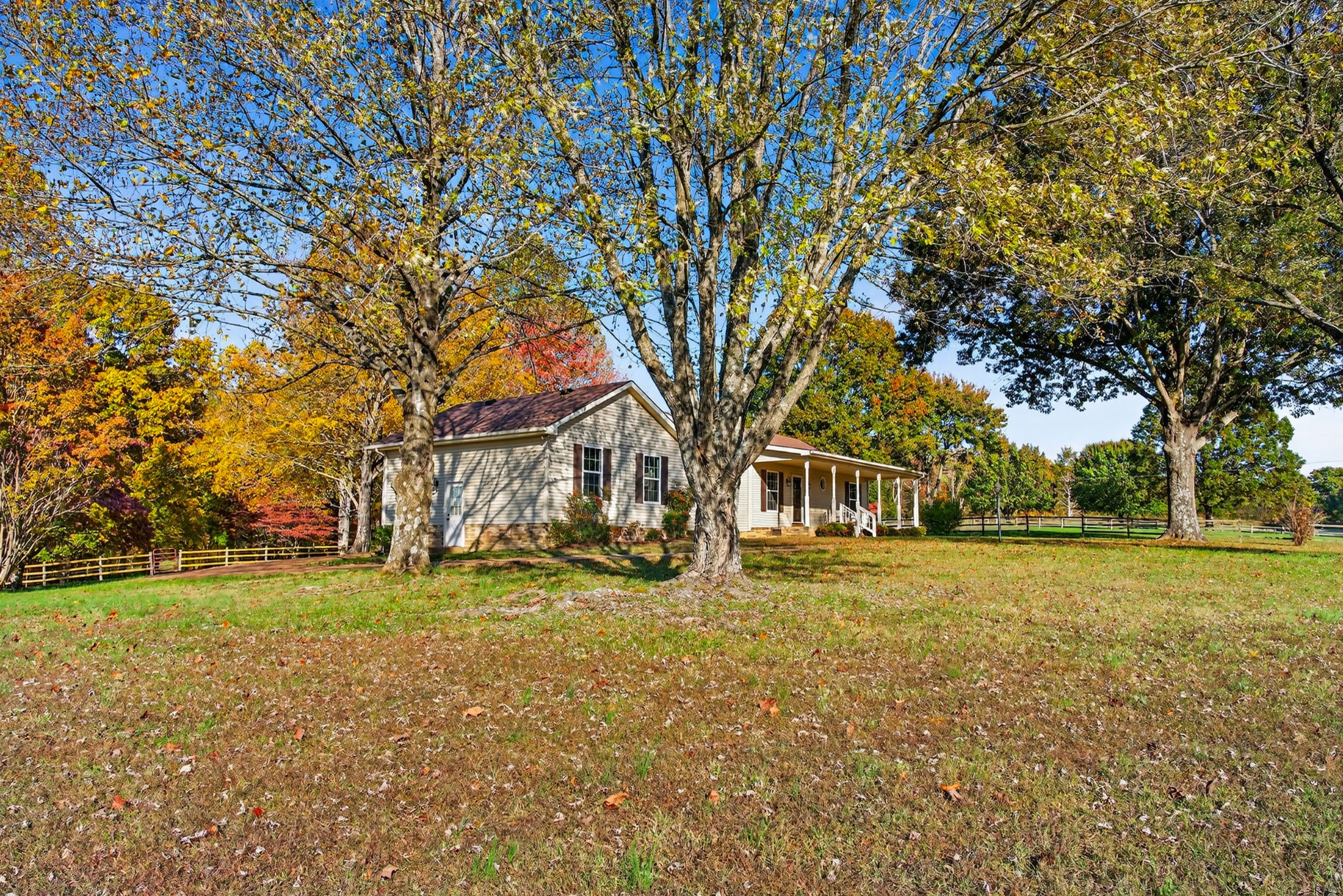 226 West Biggs Road Cottontown, TN 37048 - Photo 11 of 56 a big yard with trees in front of it