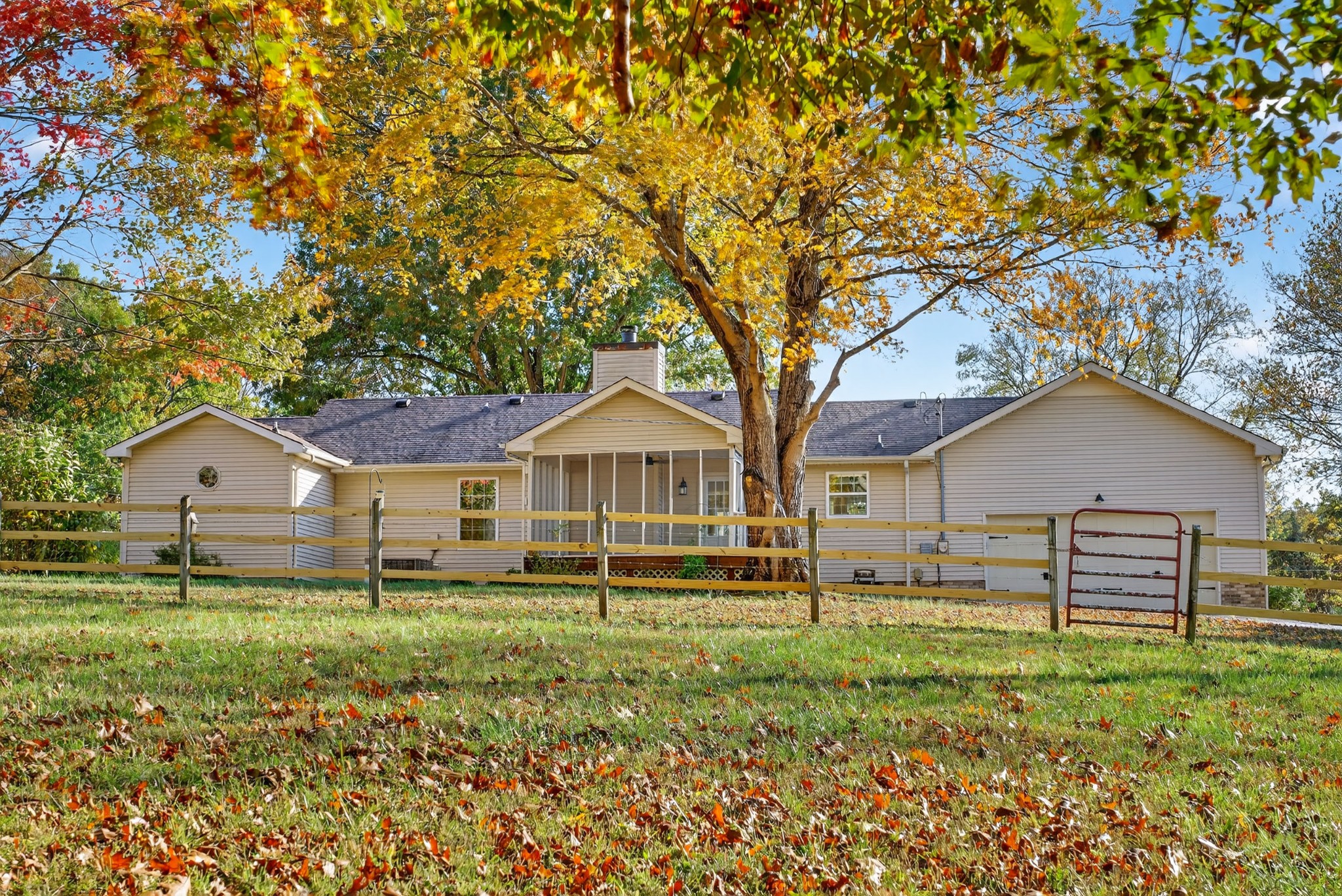 226 West Biggs Road Cottontown, TN 37048 - Photo 19 of 56 a front view of a house with a garden