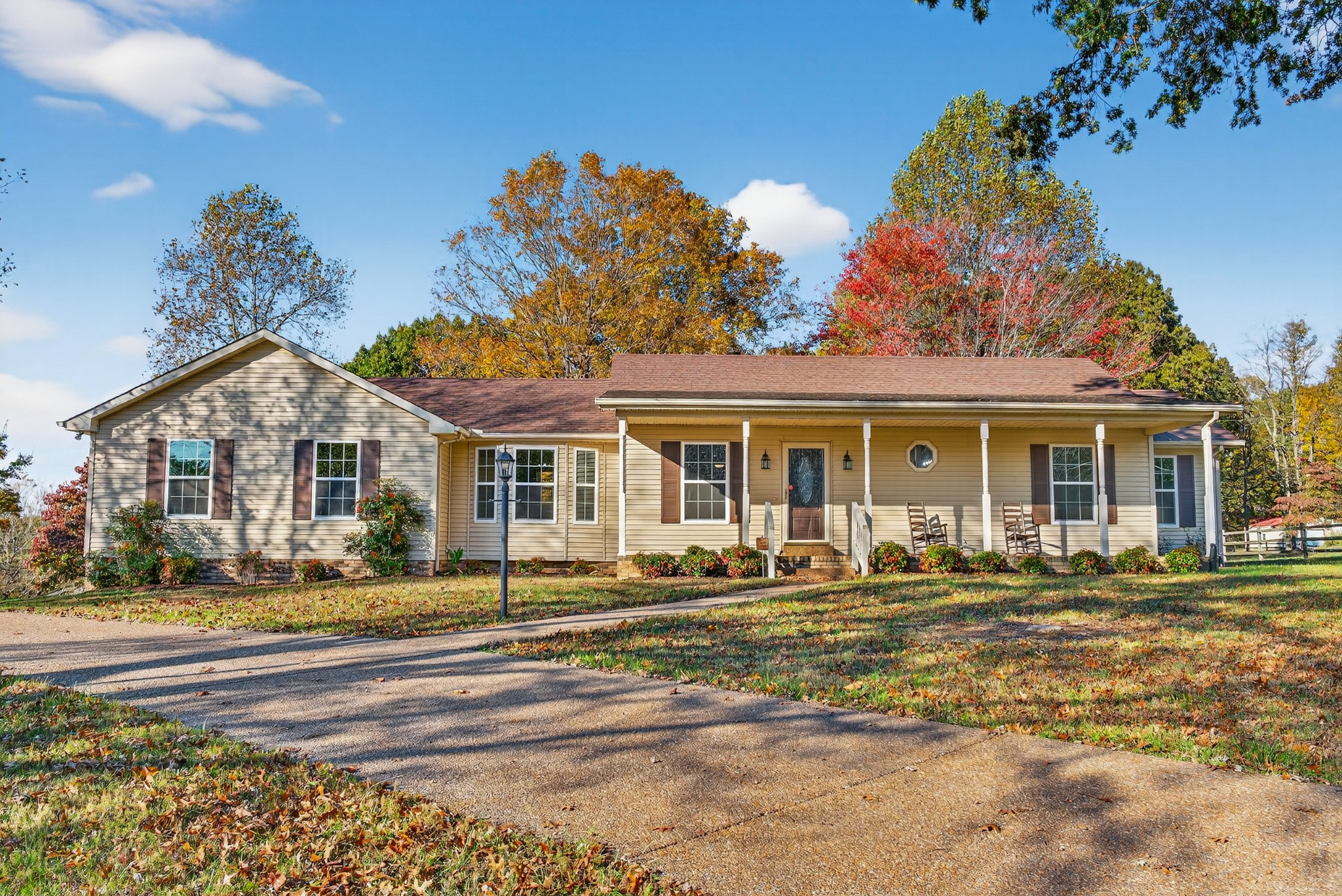 226 West Biggs Road Cottontown, TN 37048 - Photo 5 of 56 a front view of a house with a garden