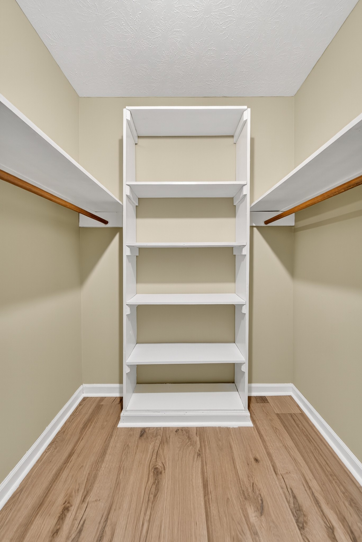 226 West Biggs Road Cottontown, TN 37048 - Photo 52 of 56 a view of room with wooden floor and staircase