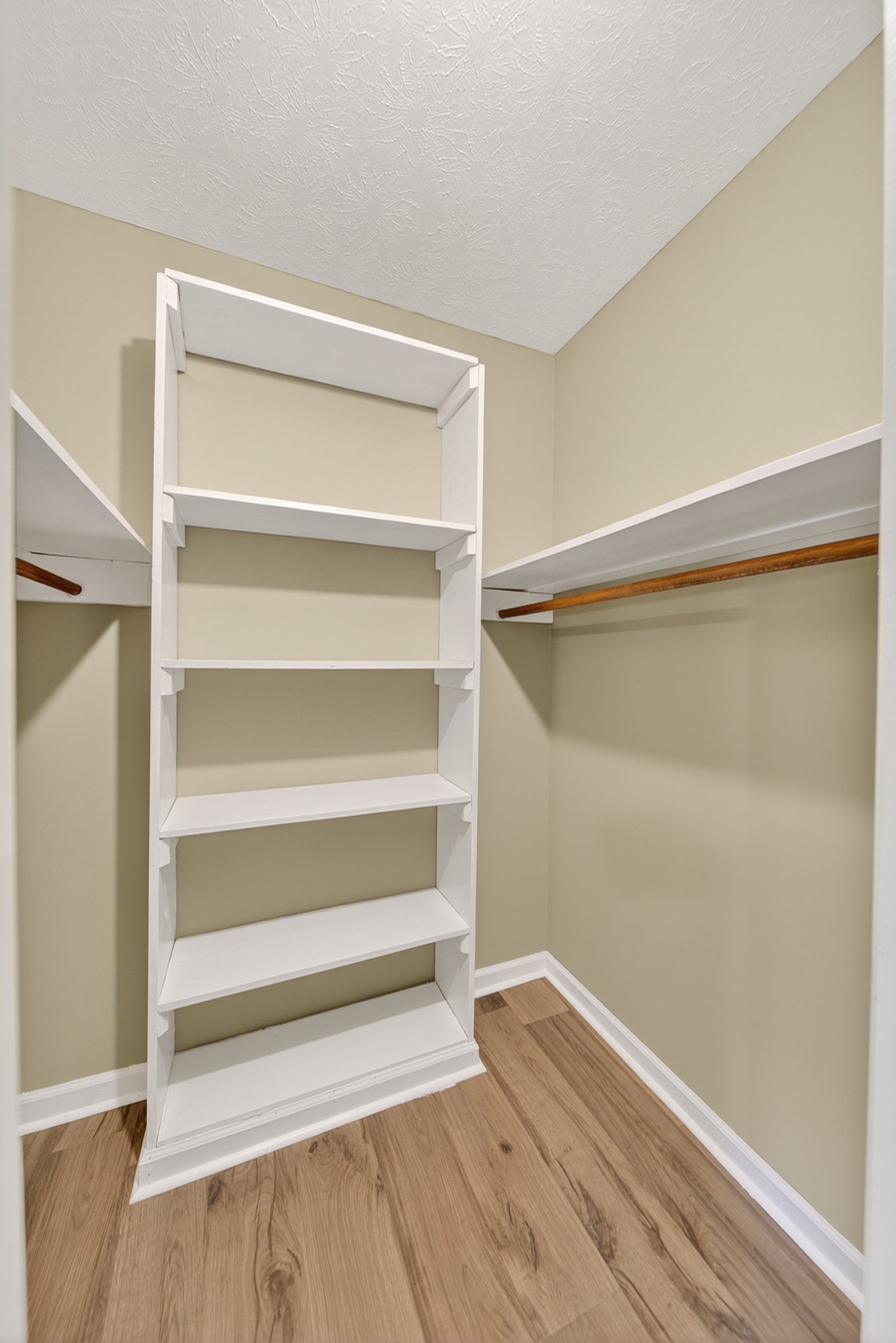 226 West Biggs Road Cottontown, TN 37048 - Photo 53 of 56 a view of walk in closet with empty racks
