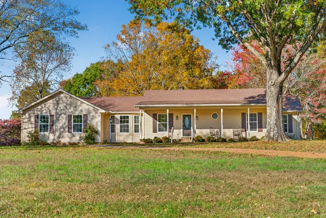 front view of a house with a yard