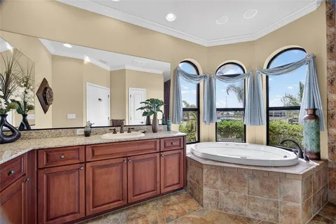 a bathroom with 2 sink and a mirror