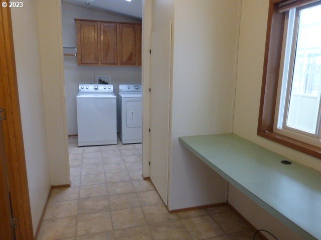 100 River Bend Road, Unit 65 Reedsport, OR 97467 - Photo 8 of 21 a room with storage and utility