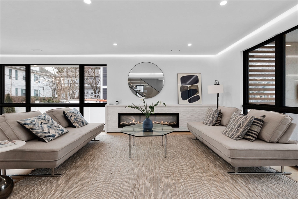 80 Alpine Street Cambridge, MA 02138 - Photo 14 of 41 a living room with furniture and a large window