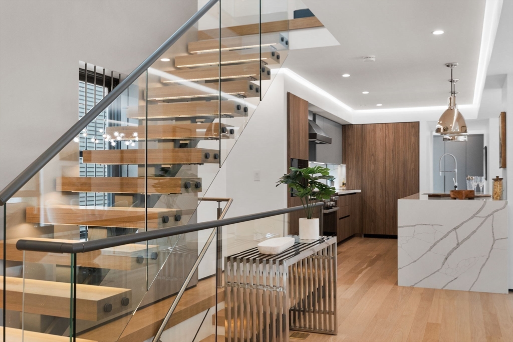 80 Alpine Street Cambridge, MA 02138 - Photo 16 of 41 a view of entryway and hall with wooden floor
