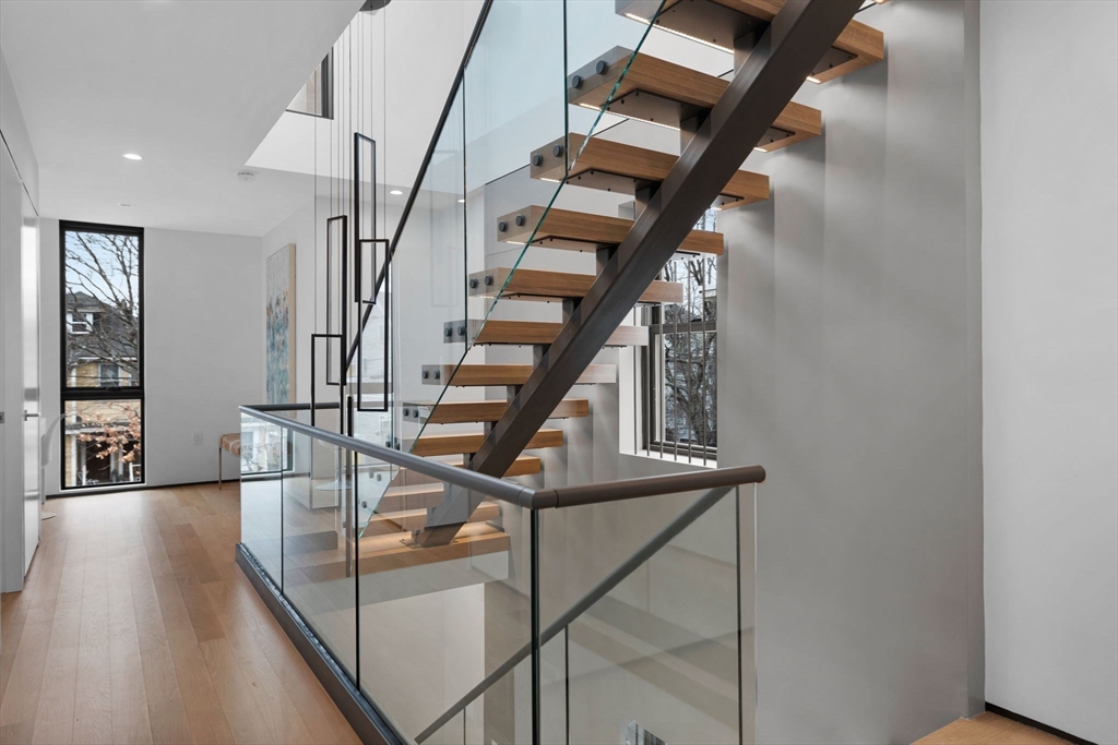 80 Alpine Street Cambridge, MA 02138 - Photo 22 of 41 a view of entryway and hall with wooden floor