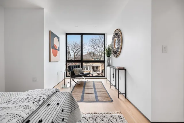 a workspace with furniture and window