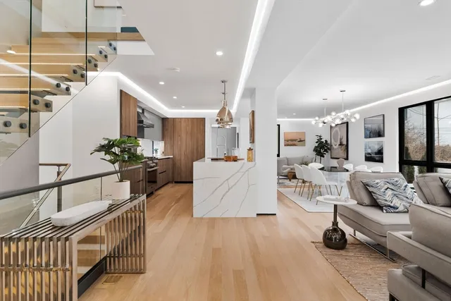 a living room with furniture and a table