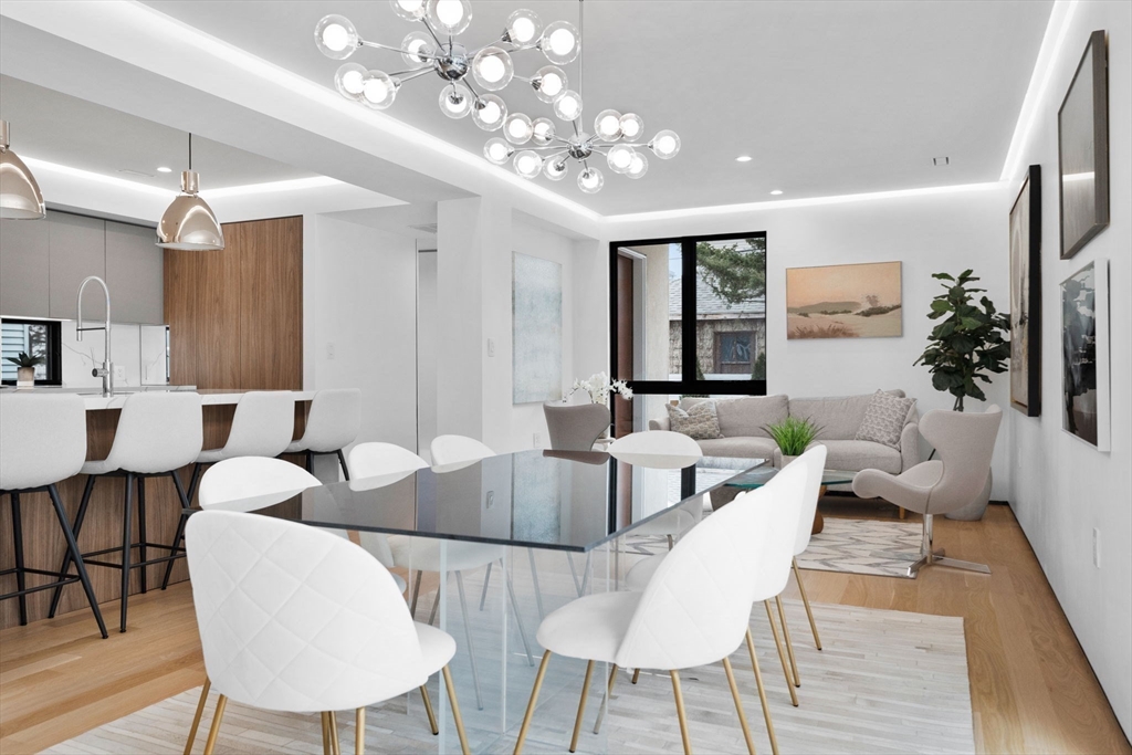 80 Alpine Street Cambridge, MA 02138 - Photo 9 of 41 a living room with furniture and a large window