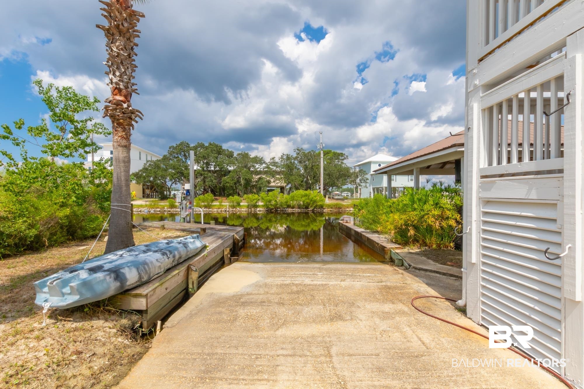 328 Windmill Ridge Road Gulf Shores, AL 36542 - Photo 31 of 47 View of patio featuring a water view