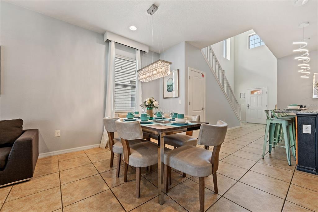 2108 Morocco Way Kissimmee, FL 34747 - Photo 24 of 57 a view of a dining room with furniture
