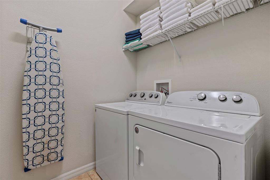 2108 Morocco Way Kissimmee, FL 34747 - Photo 37 of 57 a utility room with dryer and washer