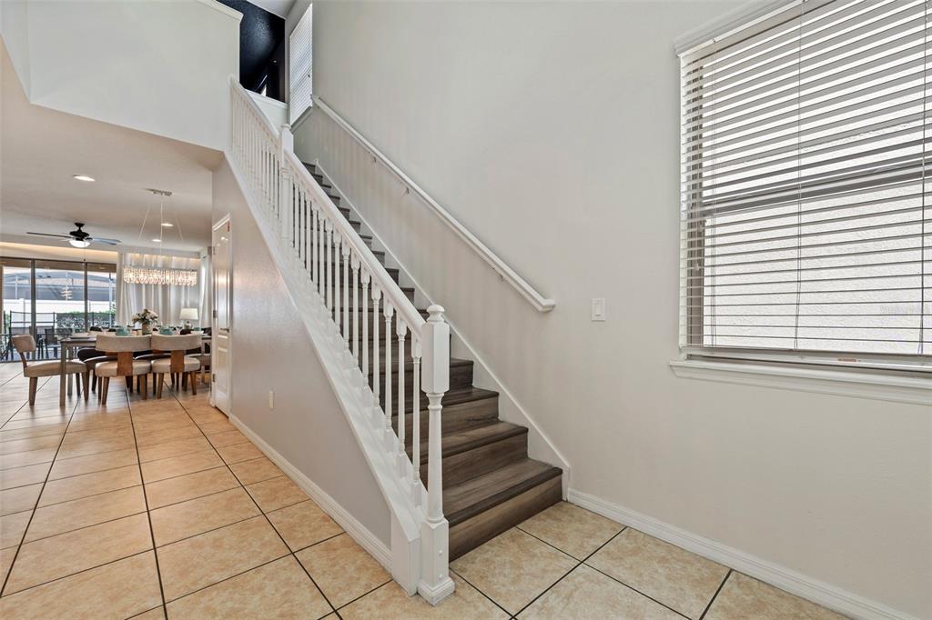 2108 Morocco Way Kissimmee, FL 34747 - Photo 38 of 57 a view of entryway and hall with dining room
