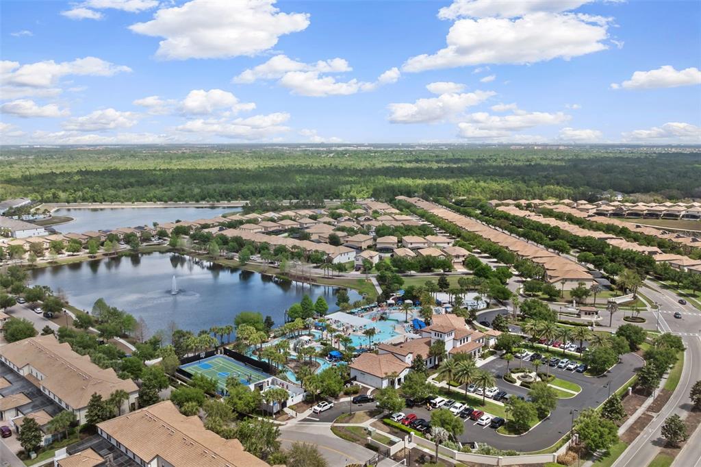 2108 Morocco Way Kissimmee, FL 34747 - Photo 7 of 57 a view of a lake with a city