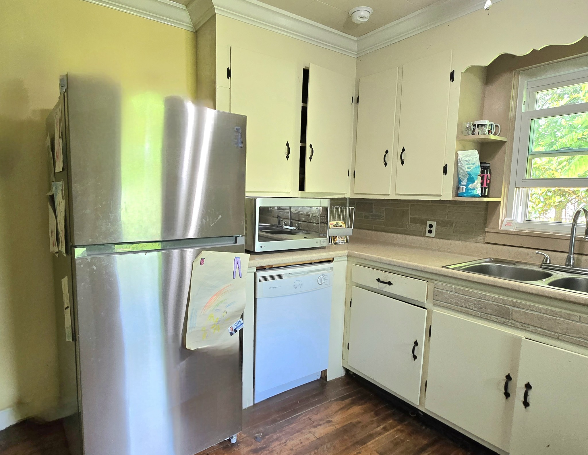 118 Bone Cave Road Rock Island, TN 38581 - Photo 12 of 52 a kitchen with stainless steel appliances granite countertop a refrigerator sink and cabinets