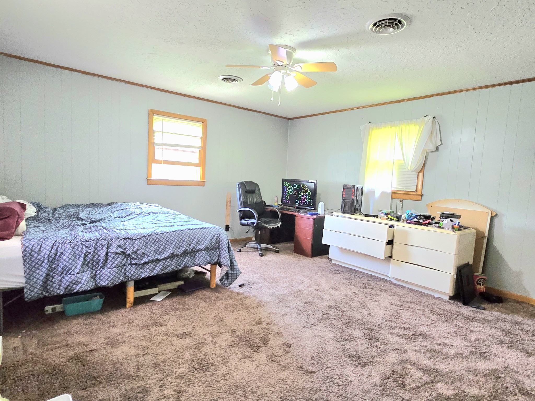 118 Bone Cave Road Rock Island, TN 38581 - Photo 14 of 52 a spacious bedroom with a bed and a table
